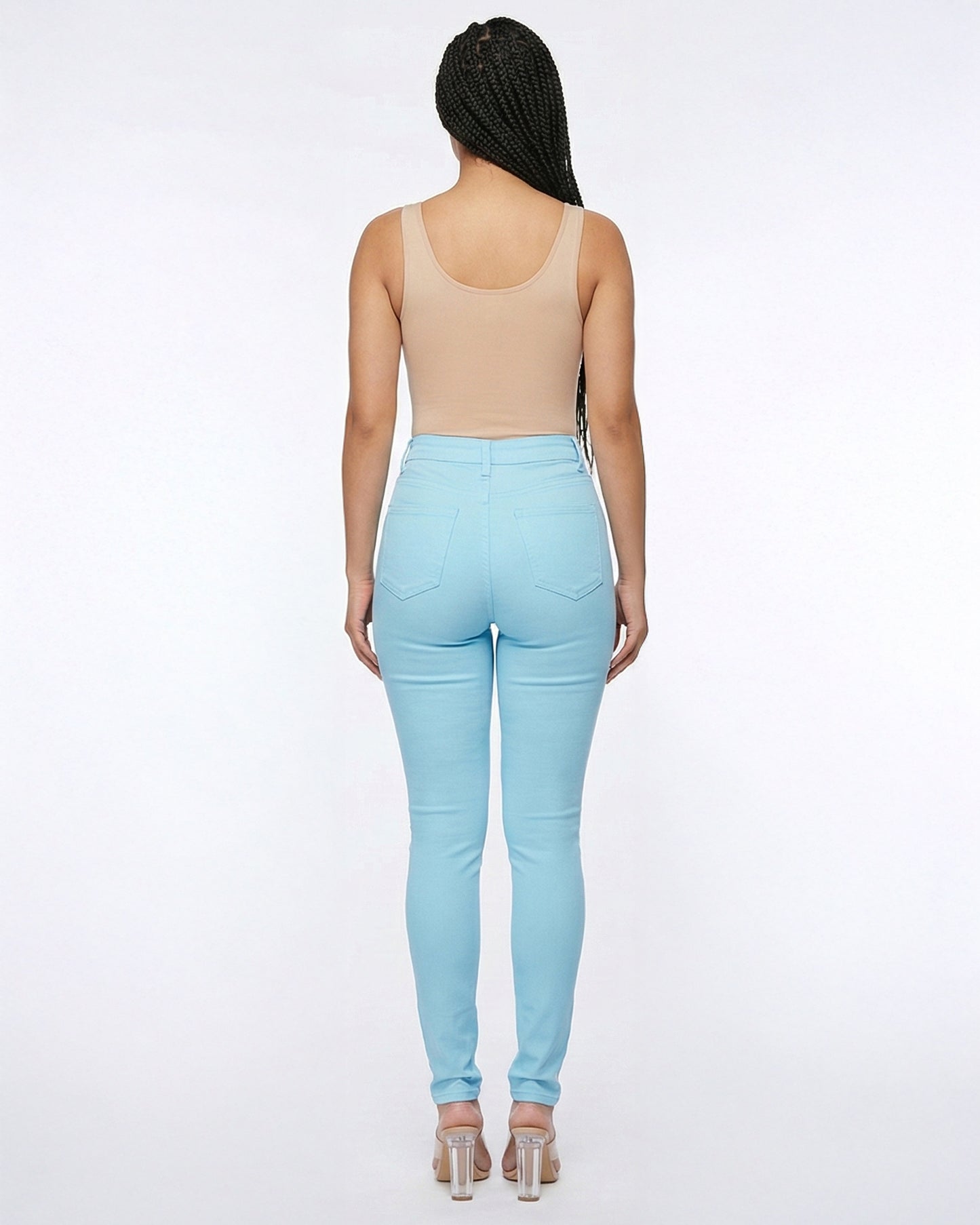 Back view of light blue skinny jeans on a model