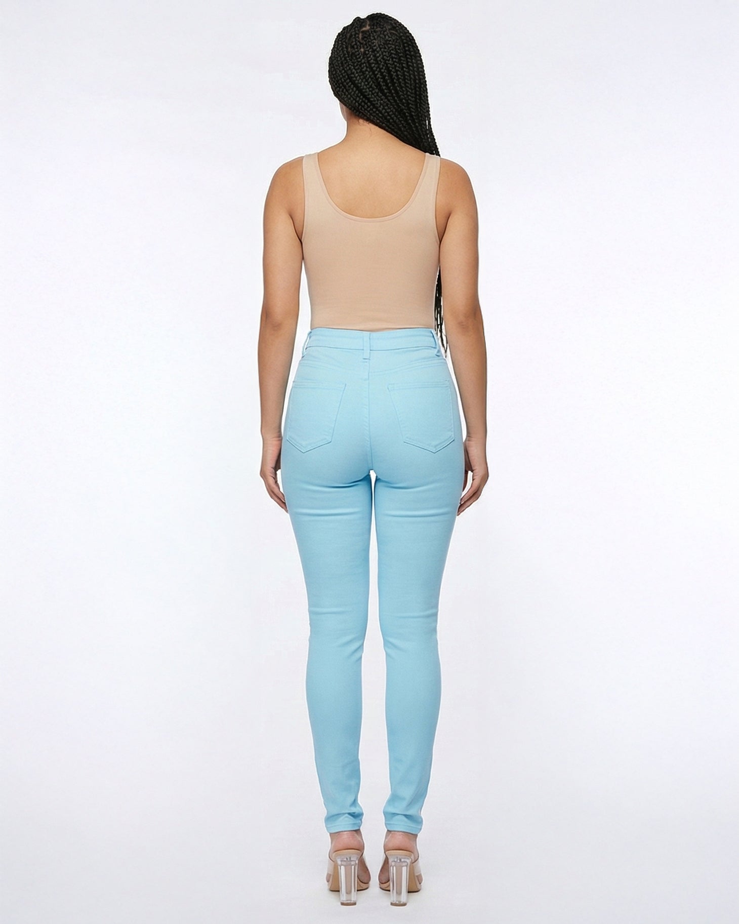 Back view of light blue skinny jeans on a model