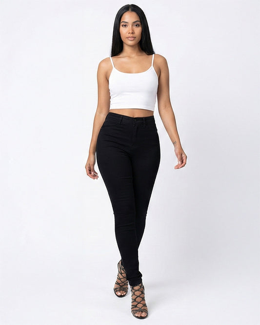  Woman wearing black tank top and jet black stretch skinny jeans 