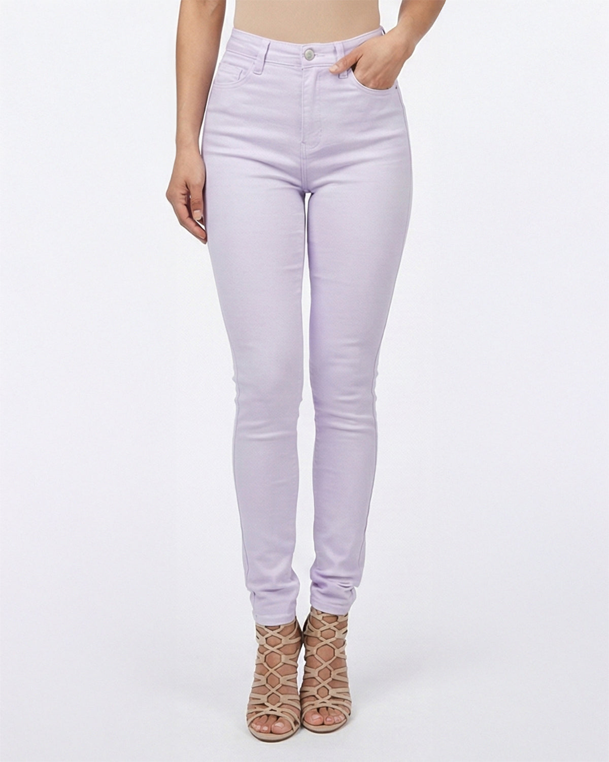 Close up angle of model wearing light purple skinny jeans showing pockets and stitching